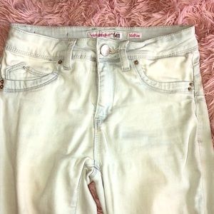 Very light blue ripped mid rise jeans